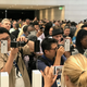 People cram in to get their first glimpse of the iPhone X.
